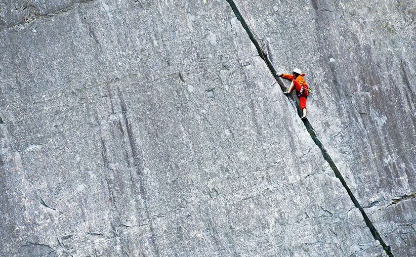 rock climber in orange