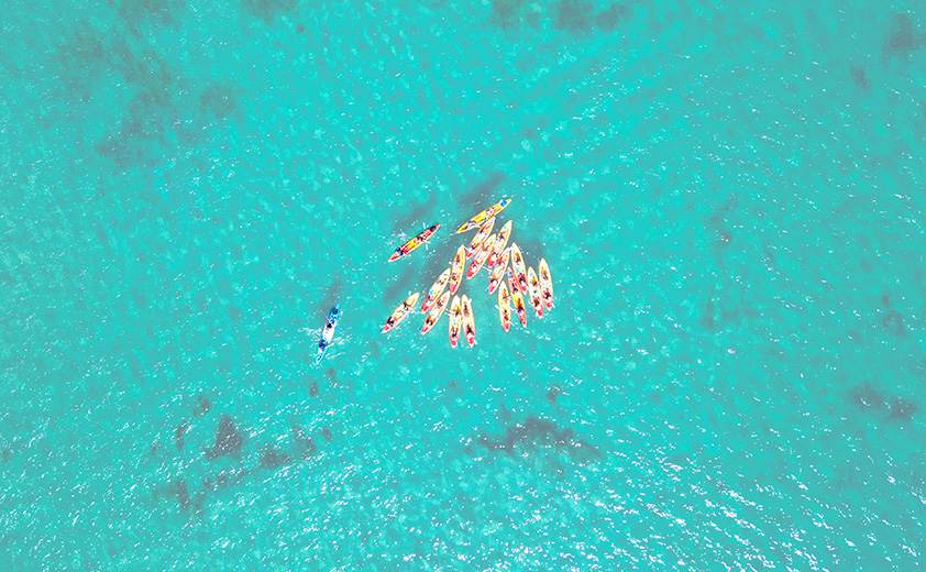 group of boats on turquoise water